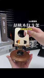 AE Direct manufacturer of metal rotating phone stand tablet stress-relief mechanical sound foldable hollow-out design for heat dissipation