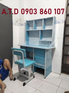 Bàn học sinh cấp 1 cấp 2 gỗ ép có kệ giá rẻ tặng hình dán đáng yêu