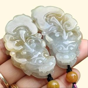 Hight Quality Pair of Yellow with Light Green Hue Natural Type A Jadeite Jade crafted as Pixiu for Pendant certificate weighs 30.53 grams 30.35 grams measurements 50.5 * 26 * 11.5 / 50.5 * 26.2 * 11.5 mm (pendant278)