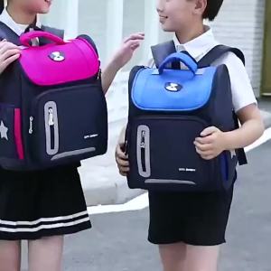 กระเป๋าเป้โรงเรียนประถมสำหรับเด็กพร้อมการพิมพ์แบบกำหนดเอง ขายส่งสำหรับเด็กชายและเด็กหญิง 6-12 กระเป๋าเป้สะพายหลังสองข้างปี กระเป๋าอวกาศ ขายตรงจากโรงงาน