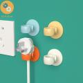 DOUBLEL Nail-free Plug Hook Non-marking Wall Adhesive Plug Storage Holder Multifunctional Plastic Power Plug Holder for Home. 