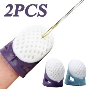 ปลอกซิลิโคนกันติดสำหรับนิ้วมือ2ชิ้นปลอกสวมนิ้วกันติดป้องกันปลายนิ้วสำหรับใช้ในครัวเรือนเครื่องมือตัดเย็บงานฝีมือปลอกสวมนิ้วมือมัลติฟังก์ชัน