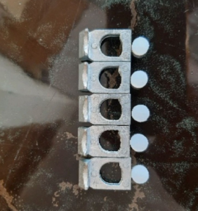 Suku cadang paculan pengait kuncian regulator kompor gas