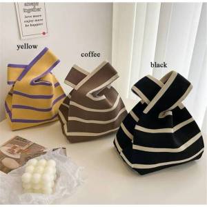 ins เน็ตไอดอลใหม่กระเป๋าผู้หญิงบินถักไหมพรมถังกระเป๋าญี่ปุ่นและเกาหลีร้อยมือหิ้วกระเป๋าลำลอง TOT กล่องอาหารกลางวัน