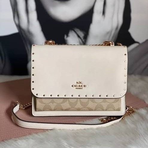 Coach Klare Crossbody in Signature Canvas with Rivets: A Stylish Companion