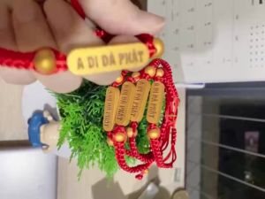 Vòng tay chỉ đỏ A DI Đà Phật