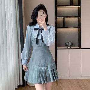 แฟชั่นเสื้อแขนยาวผู้หญิง 2025 ใหม่อารมณ์โบว์ชุดการออกแบบความรู้สึกแขนฟองจับคู่สีกระโปรงจีบสองชิ้นปลอม