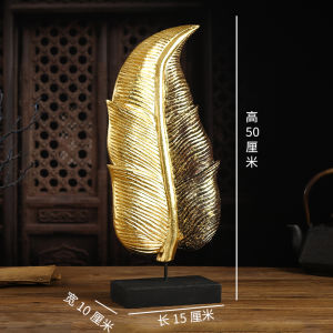 ห้องนั่งเล่นไม้เนื้อแข็งประดับสมัยเอเชียอาคเนย์สร้างสรรค์ห้องนั่งเล่นโต๊ะตกแต่งโรงแรมคลับเฮาส์ใบตองสองสี ลูกตุ้มใบไม้สีทอง เครื่องประดับตกแต่งร้านนวด