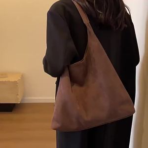 AE Túi xách nữ phong cách retro tiện dụng dung tích lớn 2026 Túi tote da lộn mùa thu đông mới túi đeo vai đa năng độc đáo