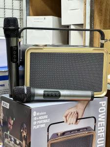 ลำโพงบลูทูธ รุ่นM300 แถมไมค์ลอย 2ตัว มีที่หิ้วพกพาง่าย รองรับ AUX/TF/USB เสียบไมค์สายเพิ่มได้  เสียงเบสแน่น