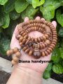 Tasbih Budha 108 butir kayu kelor mas jawa model pipih Tasbih 108 butir kayu Kelor mas jawa Tasbih japamala. 