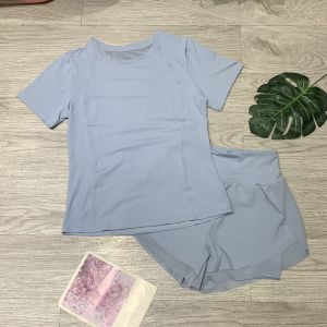 Bộ đồ tập gym yoga aerobic thể thao nữ bao gồm áo thun tay ngắn phủ bụng quần đùi 2 lớp chất liệu thun lạnh BINSPORTS BN093