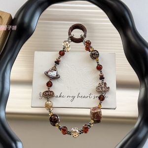 เจ้าหญิงอัลลอยการ์ตูนโปรดรวย! โซ่โทรศัพท์มือถือผงคริสตัลสีดำสีเย็นหวานตกแต่งกระเป๋า KTจี้พวงกุญแจ