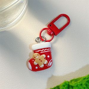 Joyncleon dễ thương người đàn ông bánh gừng giáng sinh Keychain với mũ ông già Noel và dây nơ mặt treo hoạt hình đáng yêu cho ba lô hoặc túi