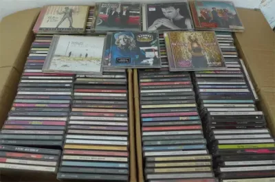 CD Music ซีดีเพลง ซีดีแท้ กล่องละ 100 แผ่นสุ่ม พร้อมกล่อง ป๊อป ร็อค โฟล์ค แร็ป ฯลฯ (รวมอัลบั้ม)