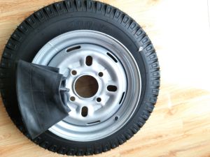 1 bánh 500-12 tim ốc lazang 8x115 bao gồm 1 lốp1 săm1 lazang.lốp 8pr.lazang tim lỗ đo vuông 8cm.đo chéo 115cm