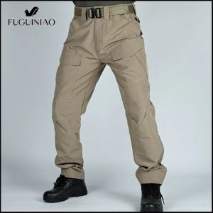 FUGUINIAO กางเกงขายาวยุทธวิธีกลางแจ้งสำหรับผู้ชาย ทหารสวมกางเกงขายาว Windproof Cargo การฝึกอบรมกองทัพ กางเกงขายาวหลายกระเป๋า กางเกงขายาวลำลอง