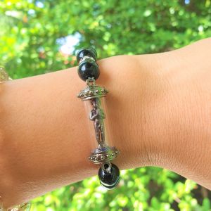 กำไล ไอ้ไข่วัดเจดีย์ ขอได้ไหว้รับ ฝังเพชร หินนิล1cm. ขนาดรอบกำไล18cm. เหมาะกับแขน17-20cm. องค์3cm.