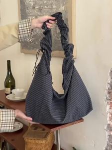 Korean-style vintage plaid canvas bag 2026 New large-capacity drawstring tote bag niche commuter shoulder and crossbody bag