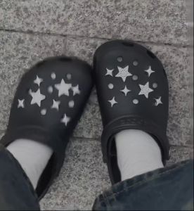 Brand-new shiny silver 3D star shoe charms—perfect for DIY styling and mixing and matching.