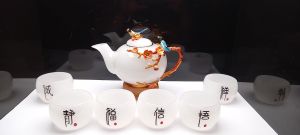 Bộ ấm trà Bạch ngọc hoạ tiết hoa đào và chim mùa xuân.