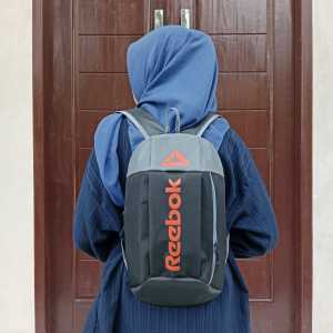 Tas Ransel Olahraga Multifungsi Reebok Warna Hitam dengan Aksen Orange