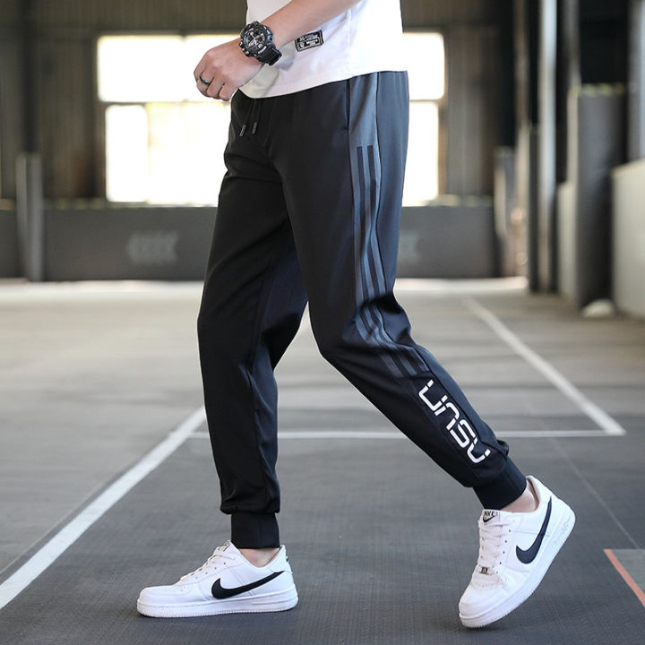 The New Autumn Sports Pants Men's Casual Running Ankle-Tied Sweatpants  Spring and Autumn Fleece-Lined Quick-Drying Ice Silk Fitness Trousers Woven