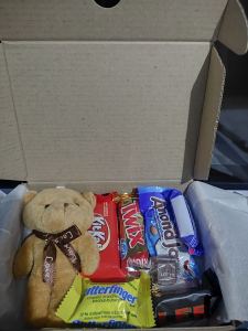 Gift box of chocolate with cute teddy nd free message