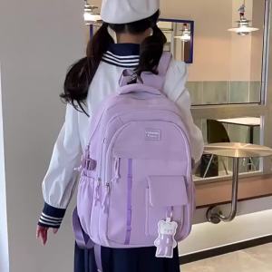 AE2026 New model school backpack for elementary and junior high school girls designed to reduce burden and protect the spine large capacity and ultra-light for high school girls and boys