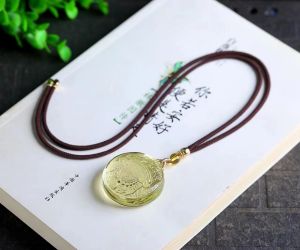 The best natural Brazilian topaz Zakiram God of wealth pendant Zakiram with wealth career peace health meaning wear smooth poly peace topaz main good fortune to avoid evil transport drive away bad luck very beautiful size: 37.6 14.6mm