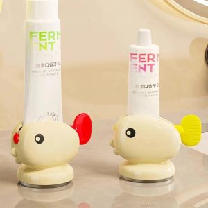 Dụng cụ nặn kem đánh răng kẹp tuýp kem hình cá dễ thương – đế hút chân không tiện lợi tiết kiệm