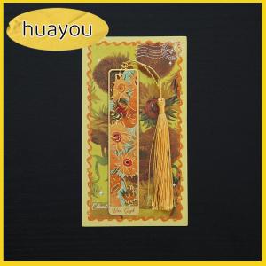 huayou ที่คั่นหนังสือโลหะลายดอกไม้ย้อนยุค1ชิ้นที่คั่นหนังสือสีบรอนซ์กลวงพร้อมพู่เครื่องเขียนของขวัญสำหรับหนังสือสโมสรผู้อ่าน