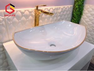 CHẬU  RỬA MẶT LAVABO THUYỀN VÀ VÒI ĐỒNG TAY LÁ MẠ VÀNG