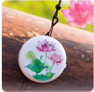 Máy niệm phật hình tròn có hoa văn hoa sen phong thủy