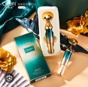 OSUFI Facial Beauty Device with Gold Handle and Teal Body in Box and Stand