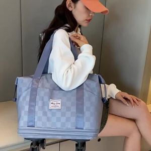 Túi du lịch dung tích siêu lớn hai ngăn mở rộng có quai xách và bánh xe túi xách tay lên máy bay túi hành lý có ngăn khô ướt riêng biệt