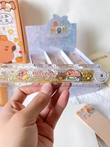 Pembaris Lipat Kartun Capybara 30cm Gliter Pelajar Ukur Lukis Ruler Sekolah Cute Capybara Quicksand 30Cm Folding Ruler Flashing Student Measurement Drawing Stationery卡通流沙卡皮巴拉30CM折叠尺入油闪闪学生测量绘图直尺学习文具E007