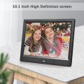 Andoer 10.1 Inch Digital Photo Frame Desktop Electronic Album 1280*800 IPS Screen Supports Photo/ Video/ Music/ Clock/ Calendar Function with Backside Stand Remote Control. 