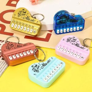 Trendy Light-Up Piano Keychain: A Portable Musical Instrument