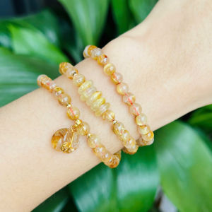 vòng tay dáng chuỗi đá thạch anh tóc vàng tự nhiên vip mix đồng điếu và túi tiền thạch anh tóc vàng vip bọc vàng tây vòng tay đá phong thủy hợp mệnh kim mệnh thổ trang sức thiết kế đủ hóa đơn thẻ bảo hành