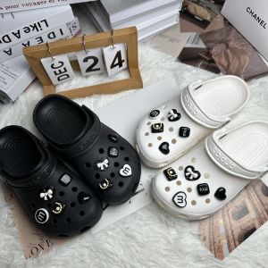 10ชิ้น/เซ็ต Crocs Jibbilz ครีมที่ถอดออกได้รองเท้าเรซินหัวเข็มขัดหัวใจปมผีเสื้อดอกไม้ประดับตกแต่งรองเท้าสำหรับ Crocs