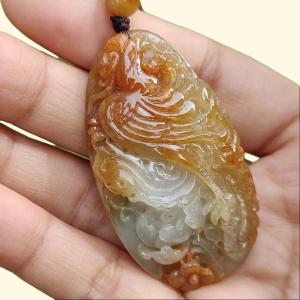Rare Light Green with Red Natural Type A Jadeite Jade crafted as Phoenix to use as Pendant certificate weighs 27.45 grams measurement 52.3 * 28.5 * 12.5 mm (pendant279)
