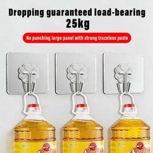 Main product: Adhesive hooks | Key attributes: Load-bearing 25kg no punching traceless paste | Fit/use: Hanging bottles | Scene: Kitchen or storage area