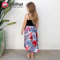 PatPat Family Matching Black Cotton Tee Beach Short-sleeve Shirt and Flora Print Splicing Halter Strap Midi Dress Sets. 