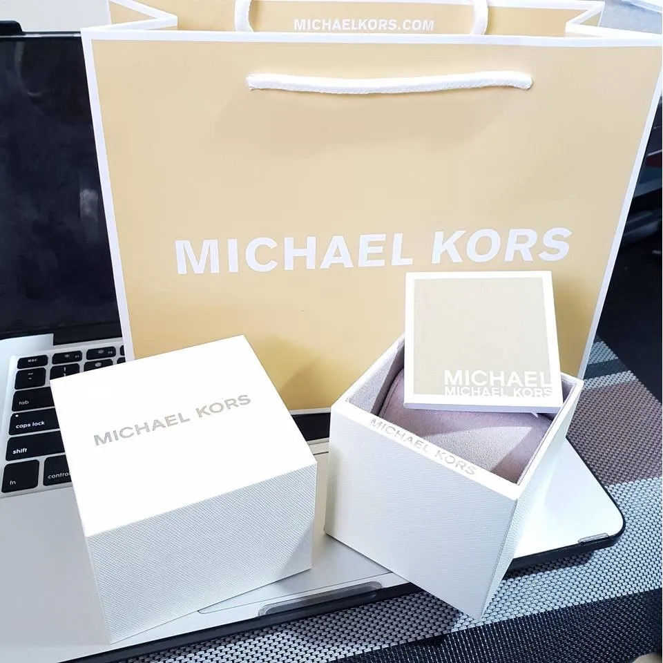 Michael kors paper hot sale bag fake