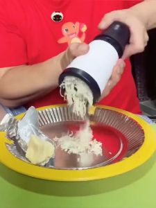 Kitchen tools cheese grater  handheld cheese shredder  cheese cutter  tabletop use  adjustable grit  easy to clean kitchen essential
