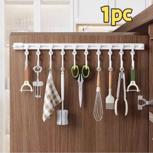 ตะขอแขวนรางเลื่อน ตะขอแขวนอุปกรณ์ครัวแบบมีกาว ราวแขวนเสื้อผ้าในตู้ ตะขอแขวนกุญแจประตูและกระเป๋า