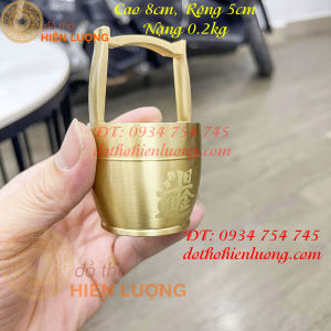 Thùng múc tiền bằng đồng để bàn thờ thần tài