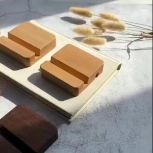 (HD1)A simple portable solid wood holder for phones tablets e-readers and home use.  Pemegang kayu padu mudah alih yang ringkas untuk telefon tablet e-pembaca dan kegunaan rumah.