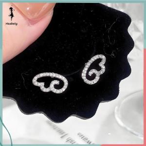 ส่วนลด 10 บาท สำหรับการซื้อ 1 ชิ้น ต่างหูเซอร์คอนแฟชั่นใหม่แบบมีปีกแห่งความรักแบบไขว้ที่ทำจากสเตนเลสต่างหูแบบถักทันสมัยสำหรับผู้หญิงอุปกรณ์เจาะร่างกาย